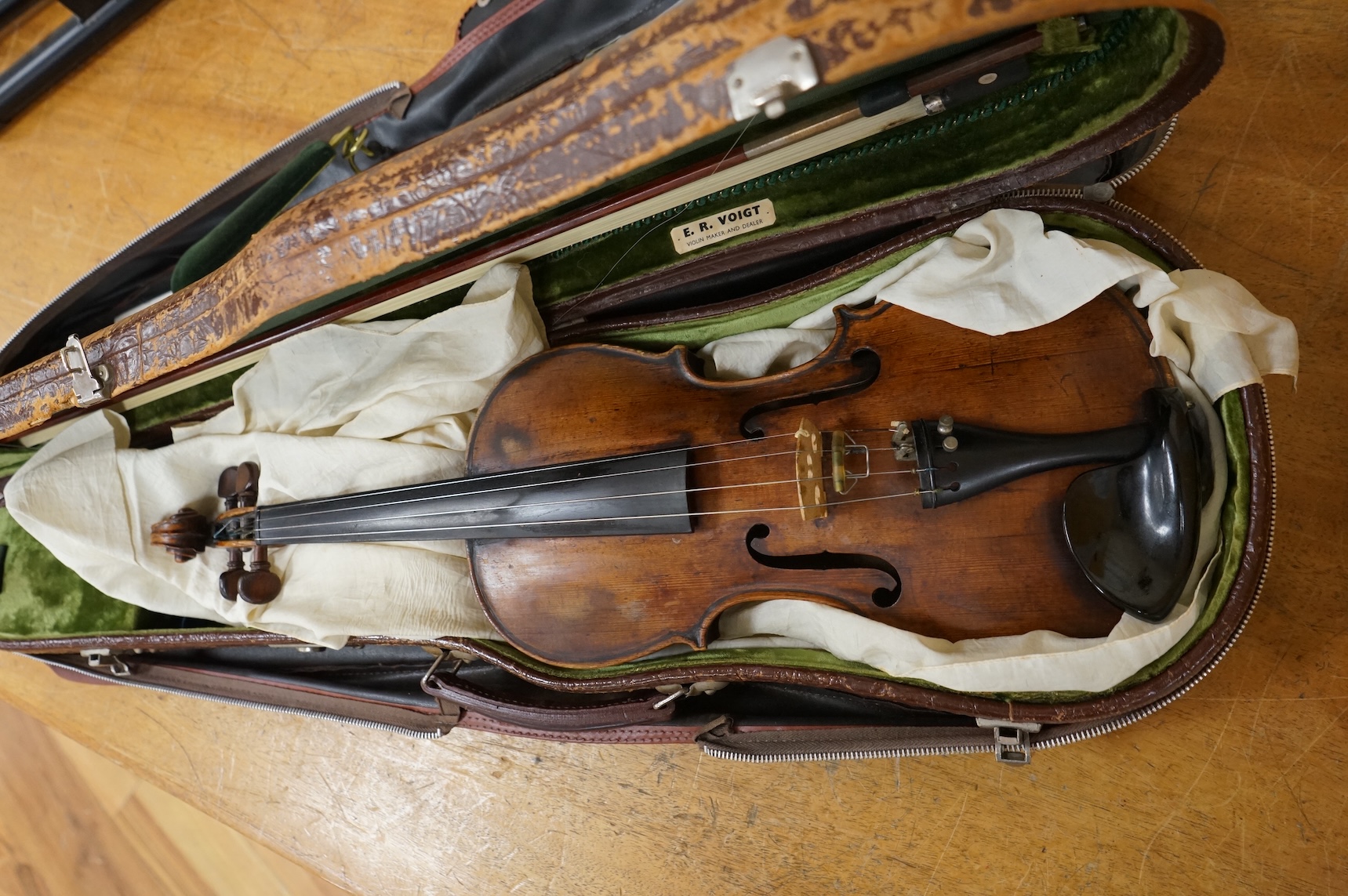 An interesting late 18th century violin, with one piece bird’s eye maple back, unsigned, with two silver fully mounted octagonal bows, one stamped Voight CITES Submission reference, 3XFNUBT7 and Submission reference, RHL